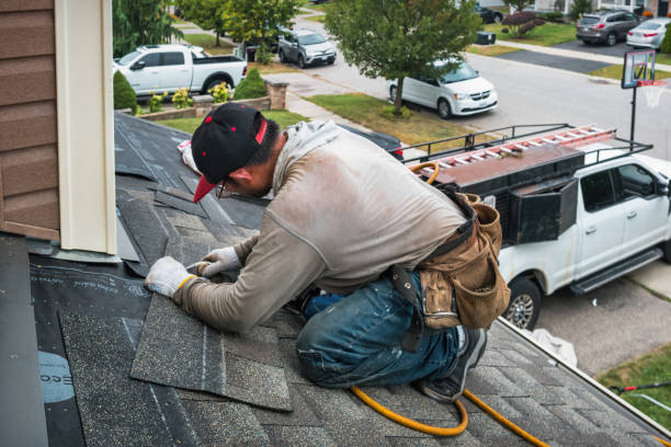 Professional Roofing technician working in Redwood City, CA